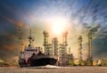 gas tanker ship and oil refinery plant background use for oil ,fuel energy and fossil power .transportation and heavy petroleum i