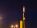 Gas venting during pipeline maintenance captured at night with a flare. Royalty Free Stock Photo