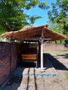 The gasebo from wooden and roof from dry leaf rice plant Royalty Free Stock Photo