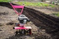 Gasoline cultivator, soil tillage, loosening. Plow, tractor gardening agriculture.