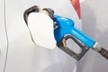 Gasoline dispenser nozzle fuel fill oil into car