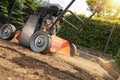 Gasoline Lawn Aerator in Action