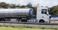 Gasoline transportation truck on highway speed blur Royalty Free Stock Photo