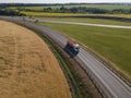 Gasoline truck Oil trailer on highway driving along the road. aerial view of Tank vehicle at work Royalty Free Stock Photo