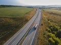 Gasoline truck Oil trailer on highway driving along the road. aerial view of Tank vehicle at work Royalty Free Stock Photo