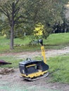 Gasoline vibratory plate compactor at a construction site Royalty Free Stock Photo