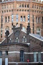 Gasometer and old building Vienna