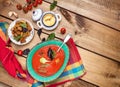 Gaspacho and ingredients on rustic white table Royalty Free Stock Photo