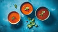 Gaspacho soup on blue tabletop. Three bowls of traditional spanish cold soup gazpacho Generative AI