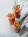 Gaspacho soup in glass bottles, vertical Royalty Free Stock Photo