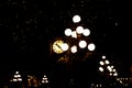 Gastown Steam Clock at night - dark background with Christmas lights