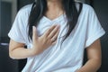 Asian woman having or symptomatic reflux acids