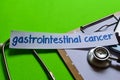 Gastrointestinal cancer on Healthcare concept with green background