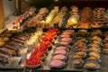 Here is a brief overview of French gastronomy with this presentation of food-filled display cases