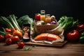 Gastronomic still life with a piece of fresh red fish on a background of fresh vegetables , a bottle of oil and freshly