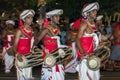 Gatabera Players perfom infront of huge crowds lining the streets of Kandy during the Esala Perahera in Kandy, Sri Lanka.