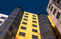 Gatchina, Russia - April 7, 2018: A modern new building against the blue sky. The building has a bright yellow and white