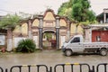 Gate of ancient mansion built from Qing dynasty in light summer rain