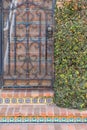 Gate at the bottom of a tiled stairway