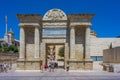 The Gate of the Bridge (Puerta del Puente) a triumphal renaissance arch on popular Roman Bridge over Royalty Free Stock Photo