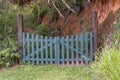 Gate closed to an abandoned property Royalty Free Stock Photo
