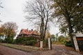 Gate court autumn yard of old gothic mansion Royalty Free Stock Photo