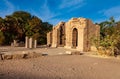 Gate of Diocletian and the ruins of the Temple of Augustus