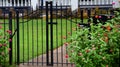 Gate Entry Surrounded by Zinnias