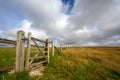 A gate and fence on a bridleway near the summit of Firle Beacon