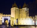 Gate of fortified city in night time. Carcassonne Royalty Free Stock Photo