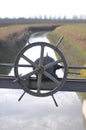 Gate in an irrigation canal Royalty Free Stock Photo