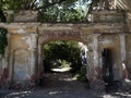 The gate of the old house and a view of the courtyard. Royalty Free Stock Photo