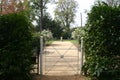 Gate opening into garden