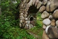 Gate or part of bridge made of big pebbels stone of granite in zoom. Royalty Free Stock Photo