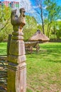 The gate`s pole wih carved rooster, Mamajeva Sloboda Cossack Village, Kyiv, Ukraine