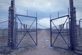 Gate to the concentration camp auschwitz-birkenau. Barbed wire fence around the death camp in Oswiecim. He assumes people during t Royalty Free Stock Photo