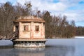 The gate tower on the pond. Drainage system of the lake. A linden alley on the shore of the lake