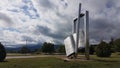 Gate of university on ioannina city, open book with pen, greece