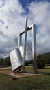 Gate of university on ioannina city, open book with pen, greece