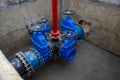 Gate valves in valve pit of the underground piping networks. Laying water system pipeline at construction site. Water supply Royalty Free Stock Photo