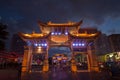 The gate of Yunnan Nationalities Village and many people are visiting at Kunming City, Yunnan Province, China.