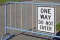 Gated area with white and balck sign reading One way do not enter Royalty Free Stock Photo
