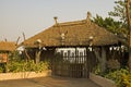 Gated entrance with thatch roof Royalty Free Stock Photo