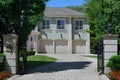 Gated entrance to three car garage