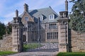 Gated stone mansion