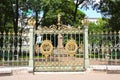 Gates and fence around the house of Peter I in St. Petersburg