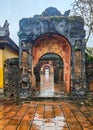 The gates gallery at Emperor Tu Duc Tomb a on a heavy rain day. Hue, Vietnam Royalty Free Stock Photo