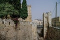 Gates in Jerusalem citadel and Tower of David in sandstorm.