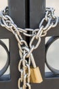 Gates locked with a chain and padlock Royalty Free Stock Photo