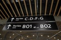 Gates portes and arrows signs inside Terminal 1 at Lyon`s Saint Exupery International Airport, France.